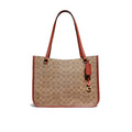 Coach Tyler Carryall In Signature Canvas