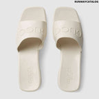 Gucci Women’s rubber slide sandal