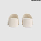 Gucci Women’s rubber slide sandal
