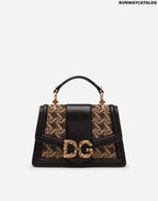 DOLCE &amp;GABBANA SMALL DG AMORE BAG IN BRAIDED RAFFIA AND POLISHED COWHIDE