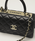CHANEL FLAP BAG WITH TOP HANDLE