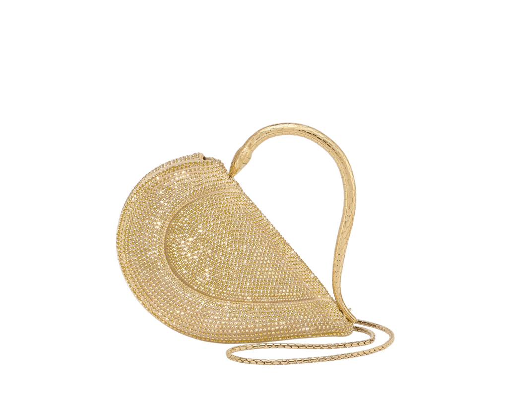 Bvlgari Serpenti Cuore 1968 Top Handle Bag in gold Neige Pavé Crystals with a serpentine metallic handle and detachable snake body-shaped chain.