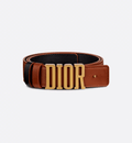 Dior D-Fence Belt in reversible calfskin with a removable Dior buckle, antique gold-finish detailing, and two removable loops for a customizable look.
