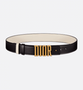 Dior D-Fence Belt in reversible black and latte calfskin with a removable Dior buckle and antique gold-finish detailing for a versatile, elegant look.