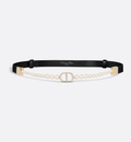 Dior 30 Montaigne Pearls Belt in black calfskin with a Swarovski® crystal-embellished CD buckle and white resin pearl detailing for a timeless, luxurious style.
