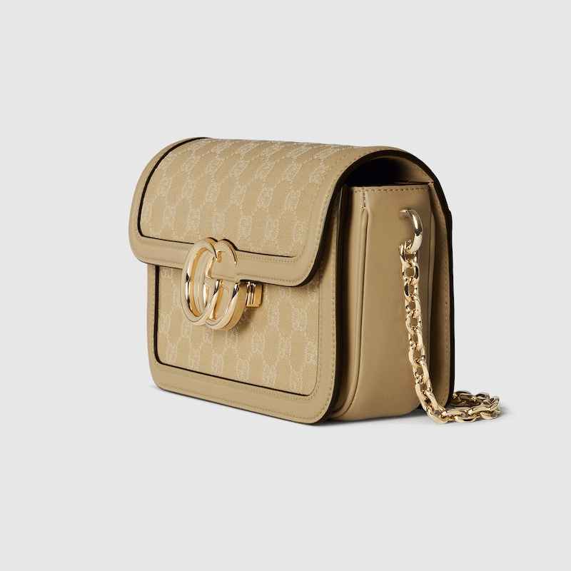 Gucci Go Small Shoulder Bag in Beige GG canvas with gold-toned hardware, a detachable mirror, and an adjustable strap for versatile styling.