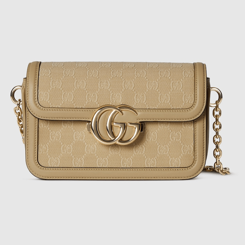 Gucci Go Small Shoulder Bag in Beige GG canvas with gold-toned hardware, a detachable mirror, and an adjustable strap for versatile styling.