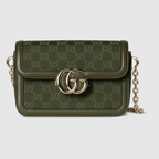 Gucci Go Small Shoulder Bag in forest green GG canvas with dark green leather trim, gold-toned hardware, and a detachable mirror.