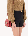 Small Rockstud Grainy Calfskin Crossbody Bag