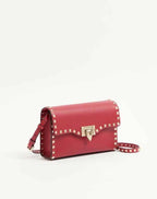 Small Rockstud Grainy Calfskin Crossbody Bag