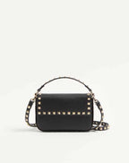 Rockstud Grainy Calfskin Pouch
