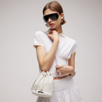 Mini bucket bag with Gucci plaque