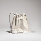 Mini bucket bag with Gucci plaque