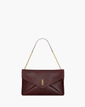 CASSANDRE LARGE POUCH ON CHAIN IN SHINY LEATHER