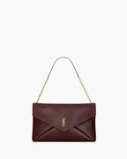 CASSANDRE LARGE POUCH ON CHAIN IN SHINY LEATHER