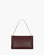 CASSANDRE LARGE POUCH ON CHAIN IN SHINY LEATHER