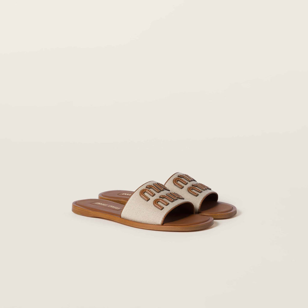 MiuMiu Canvas and leather slides