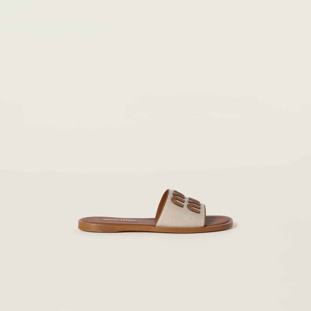 MiuMiu Canvas and leather slides