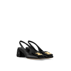 Louis Vuitton Shake Slingback Pump in black lambskin with a Malletage-patterned block heel and LV accessory for a refined statement look.