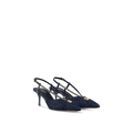 Louis Vuitton Stellar Slingback Pump in dark blue denim with gold-tone LV Circle detail, studded straps, and a star-shaped heel.
