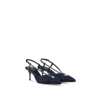 Louis Vuitton Stellar Slingback Pump in dark blue denim with gold-tone LV Circle detail, studded straps, and a star-shaped heel.