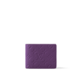 Louis Vuitton Multiple Wallet in Purple Night Taurillon Monogram cowhide leather, featuring an embossed pattern, deep purple hue, and a well-organized interior.
