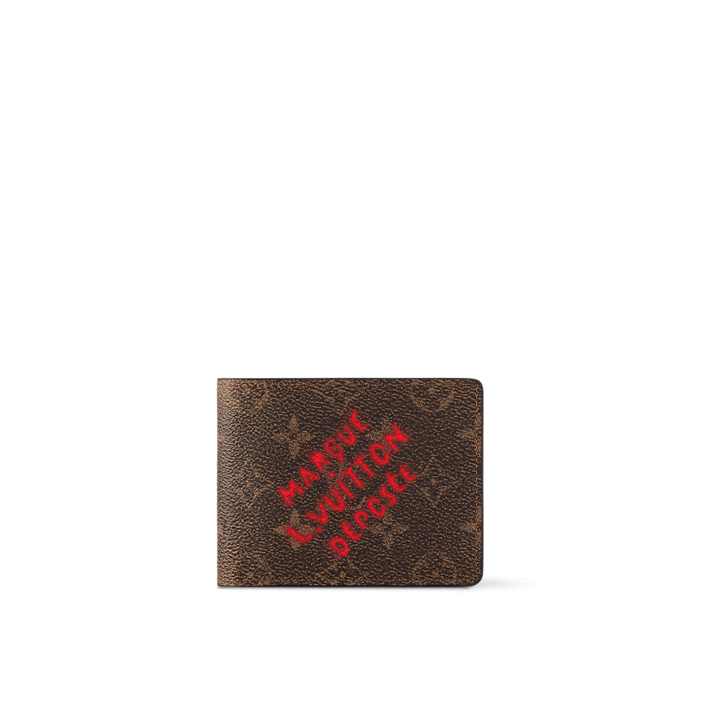 Louis Vuitton Multiple Wallet in Monogram Dust canvas with red "Marque L.Vuitton Déposée" print, aged leather trim, and multiple compartments.