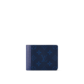 The Louis Vuitton Multiple Wallet in Navy Blue features Monogram Pacific coated canvas and Taiga leather, silver-tone hardware, and a well-organized interior with slots for cards, receipts, and bills.