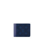 The Louis Vuitton Multiple Wallet in Navy Blue features Monogram Pacific coated canvas and Taiga leather, silver-tone hardware, and a well-organized interior with slots for cards, receipts, and bills.