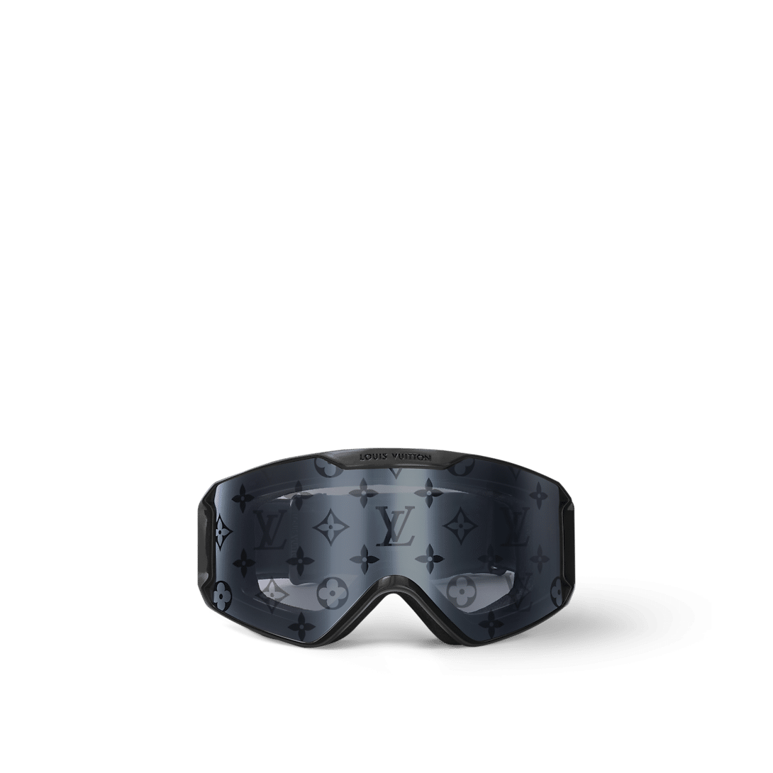 Stay stylish and protected with LV Snow ski goggles, featuring a curved silver Monogram lens, anti-fog technology, and an adjustable strap with the 5 Elements signature—crafted for luxury winter sports.