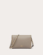SMALL ROCKSTUD GRAINY CALFSKIN CROSSBODY BAG