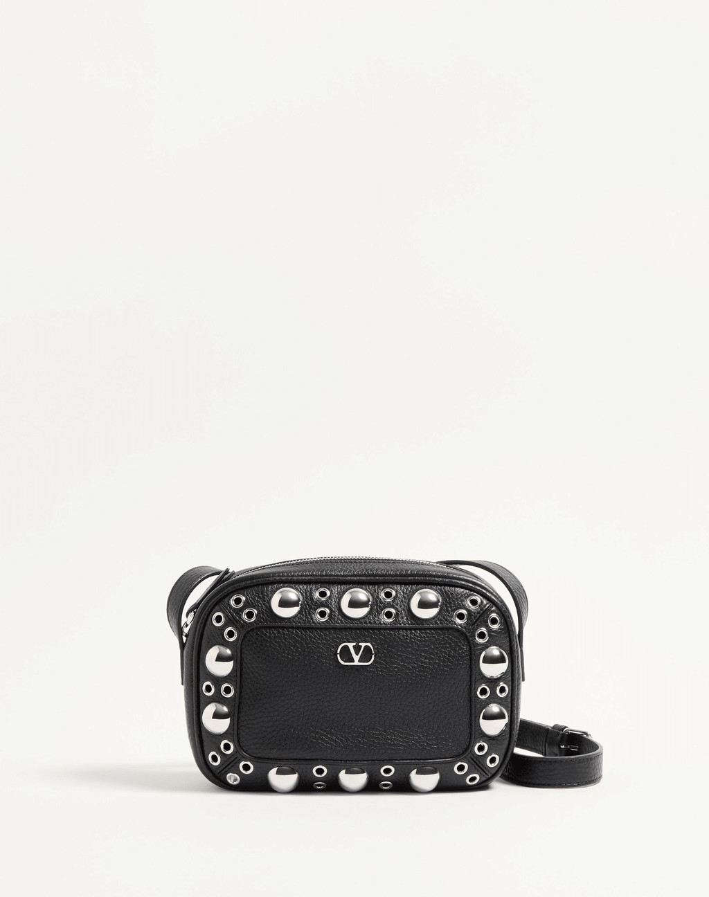 Valentino Garavani Nellcôte shoulder bag in grainy calfskin leather, featuring ball stud and rivet detailing, a VLogo Signature, palladium-finish hardware, and an adjustable leather strap for cross-body wear.