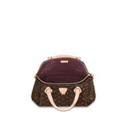 Louis Vuitton Rivoli MM Handbag