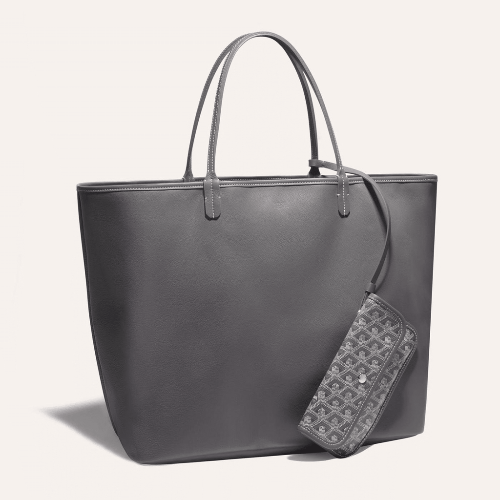 Goyard Anjou GM bag featuring a reversible leather and Goyardine canvas design, ergonomic handles, and a spacious interior for daily essentials.