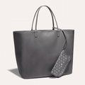 Goyard Anjou GM bag featuring a reversible leather and Goyardine canvas design, ergonomic handles, and a spacious interior for daily essentials.