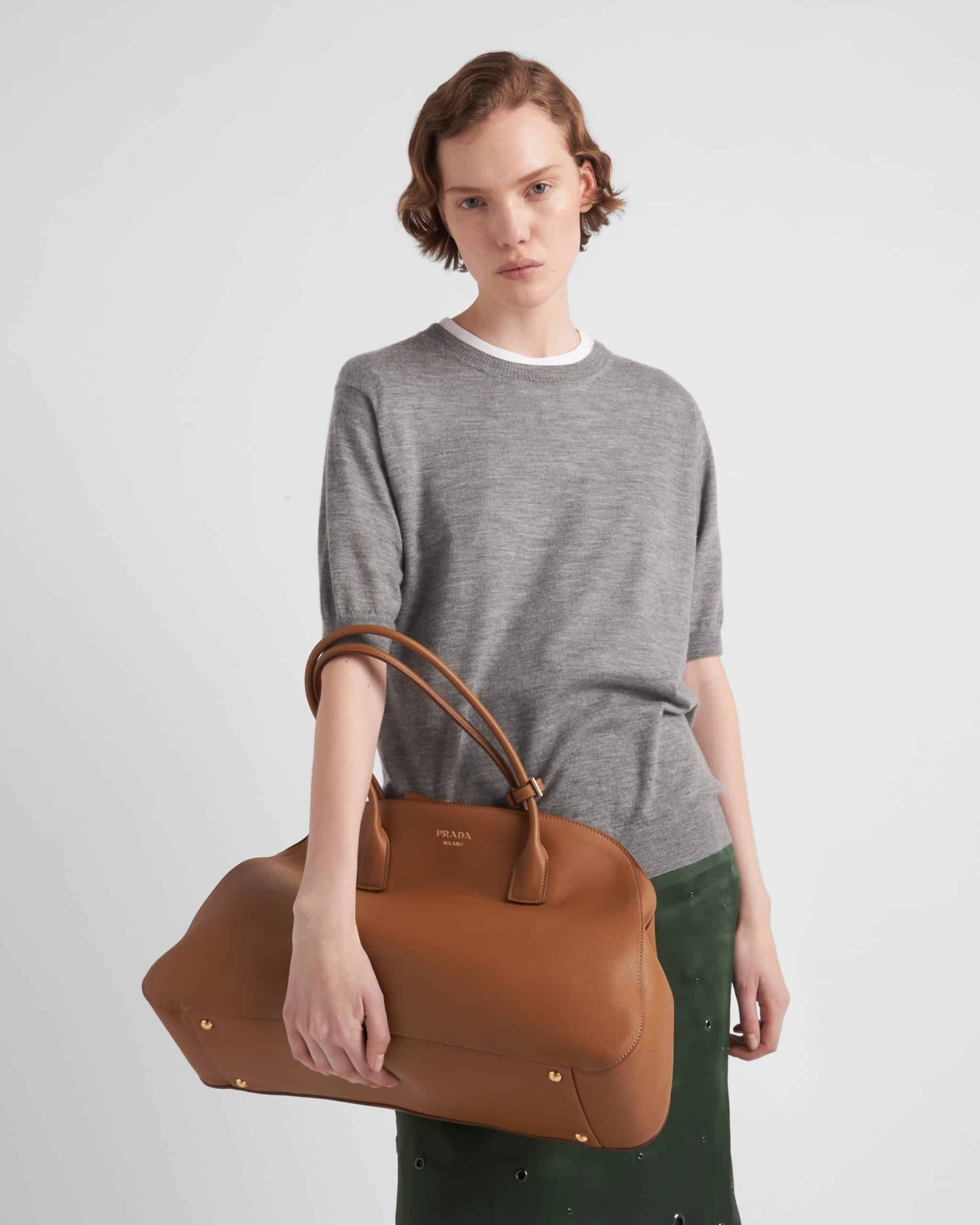 Large leather tote bag with zipper closure