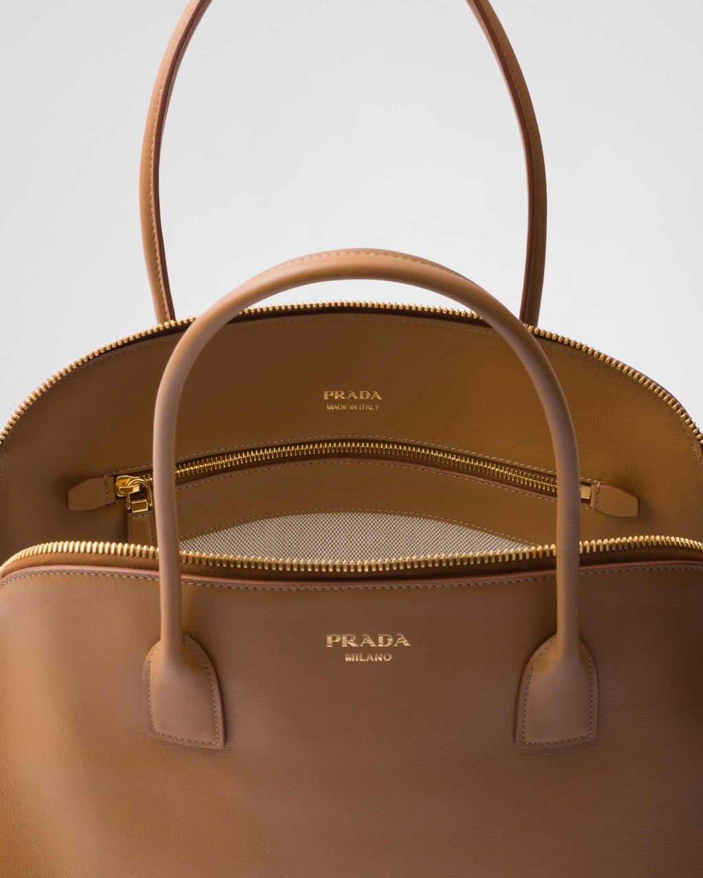 Large leather tote bag with zipper closure