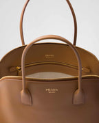 Large leather tote bag with zipper closure