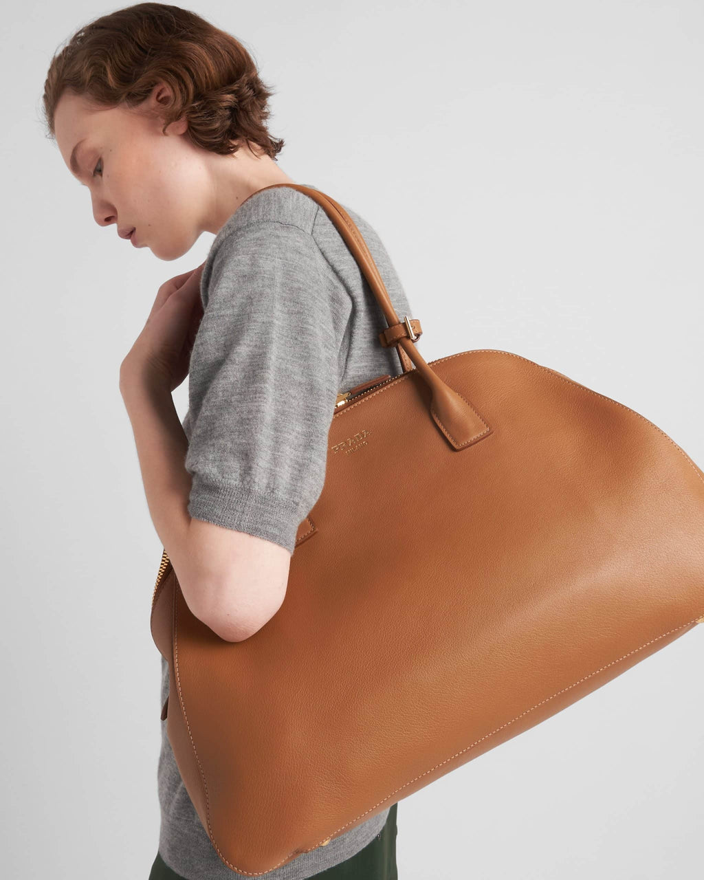 Large leather tote bag with zipper closure