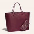 Goyard Anjou GM bag featuring a reversible leather and Goyardine canvas design, spacious interior, and ergonomic handles for all-day comfort.