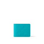 Louis Vuitton Multiple Wallet in Turquoise Taurillon Monogram leather with embossed Monogram detailing, a compact design, and multiple compartments for everyday essentials.